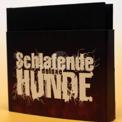 Cover eines Buches mit dem Titel "Schlafende Hunde" in auffälliger Schrift auf schwarzem Hintergrund.